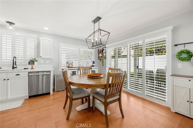 870 Clover Ln, Corona, CA 92878 - dining area with a chandelier, light wood-style floors, and recessed lighting