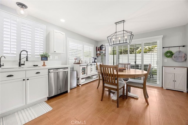 870 Clover Ln, Corona, CA 92878 - dining space featuring plenty of natural light, light wood-type flooring, a chandelier, and recessed lighting
