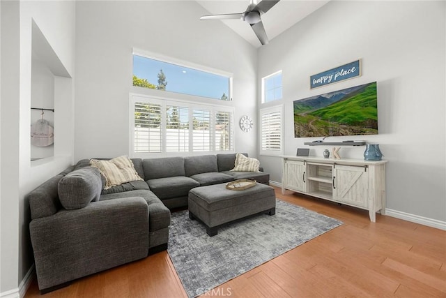 870 Clover Ln, Corona, CA 92878 - living area featuring a high ceiling, light wood-type flooring, and a ceiling fan