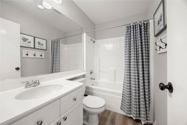 870 Clover Ln, Corona, CA 92878 - bathroom with vanity, wood finished floors, and shower / tub combo