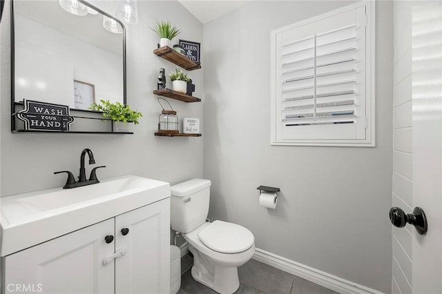 870 Clover Ln, Corona, CA 92878 - half bath with vanity and tile patterned floors
