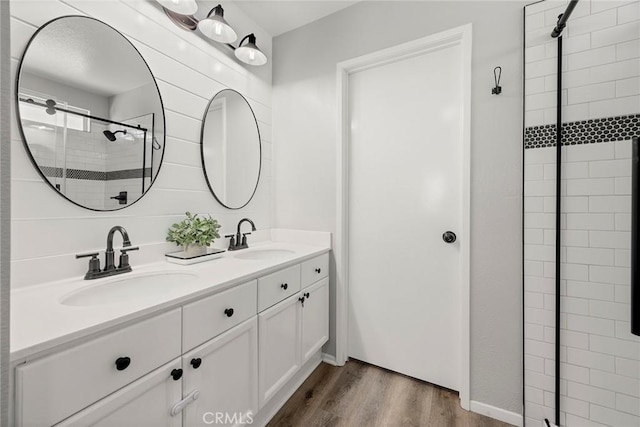 870 Clover Ln, Corona, CA 92878 - full bath with double vanity, wood finished floors, and tiled shower