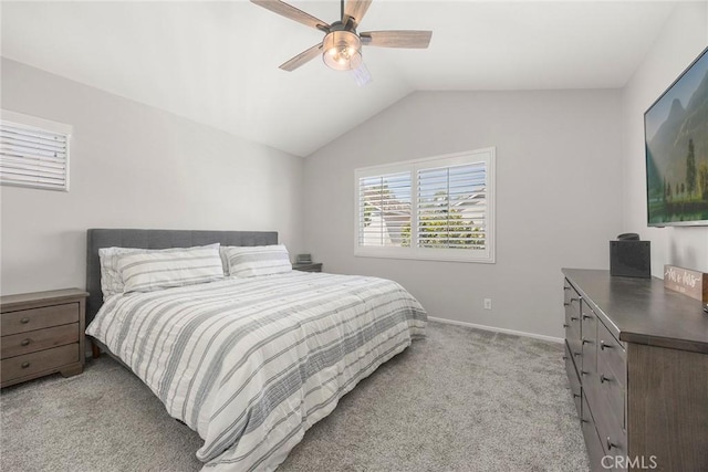 870 Clover Ln, Corona, CA 92878 - bedroom featuring light colored carpet, vaulted ceiling, and a ceiling fan