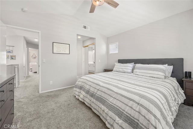 870 Clover Ln, Corona, CA 92878 - carpeted bedroom with vaulted ceiling, a ceiling fan, and connected bathroom