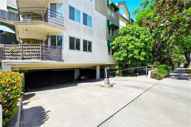1739 E Broadway Unit 6, Long Beach, CA 90802 - exterior space featuring driveway and an attached garage