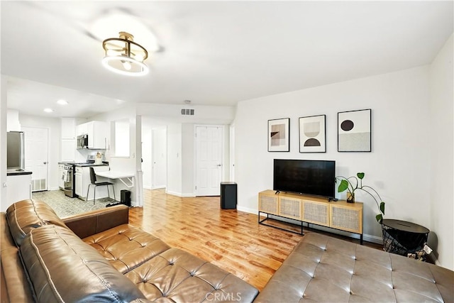 1739 E Broadway Unit 6, Long Beach, CA 90802 - living area featuring recessed lighting and light wood finished floors