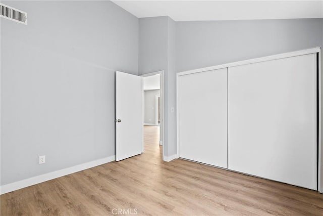 1745 Neil Armstrong St Unit 206, Montebello, CA 90640 - unfurnished bedroom featuring wood finished floors and a closet