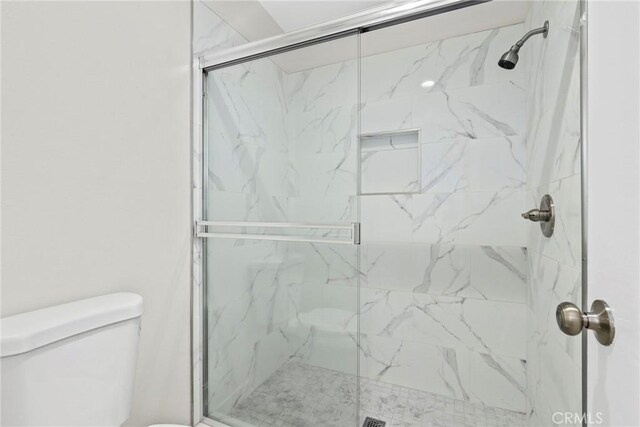 1745 Neil Armstrong St Unit 206, Montebello, CA 90640 - full bath with toilet and a marble finish shower