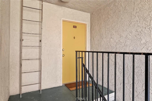 1745 Neil Armstrong St Unit 206, Montebello, CA 90640 - property entrance with stucco siding