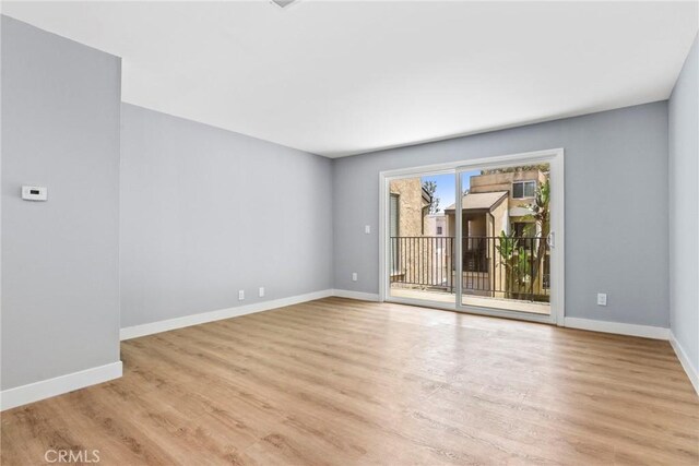 1745 Neil Armstrong St Unit 206, Montebello, CA 90640 - empty room with light wood finished floors and baseboards