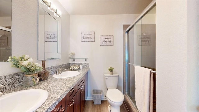 8007 New Salem St, San Diego, CA 92126 - full bathroom with a stall shower, double vanity, and wood finished floors