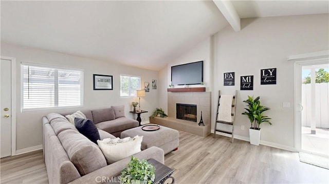8007 New Salem St, San Diego, CA 92126 - living area featuring light wood finished floors and a tile fireplace