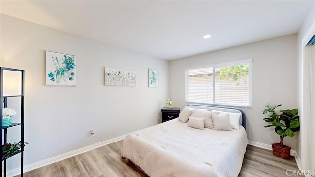 8007 New Salem St, San Diego, CA 92126 - bedroom featuring light wood-style floors and baseboards