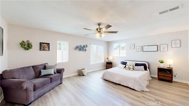 8007 New Salem St, San Diego, CA 92126 - bedroom featuring multiple windows, light wood-type flooring, and ceiling fan