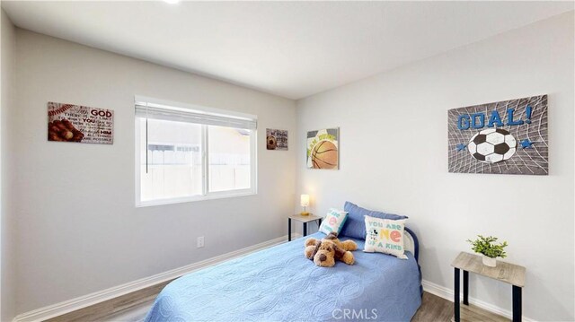 8007 New Salem St, San Diego, CA 92126 - bedroom featuring wood finished floors and baseboards