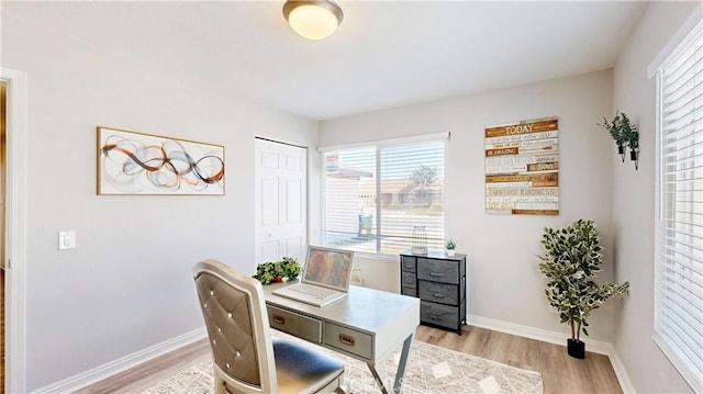 8007 New Salem St, San Diego, CA 92126 - home office featuring light wood-style floors and healthy amount of natural light