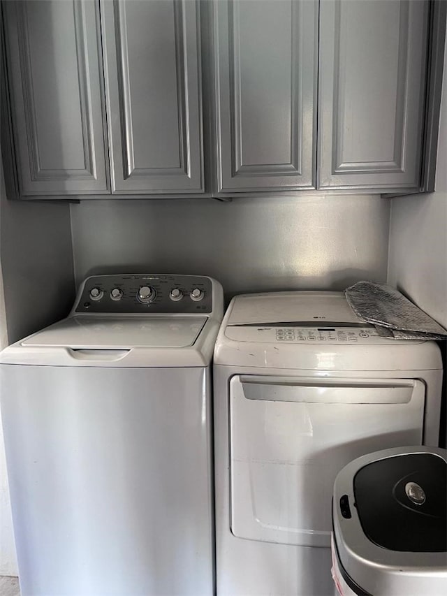 4552 Shasta Pl, El Monte, CA 91731 - laundry area featuring washer and dryer and cabinet space