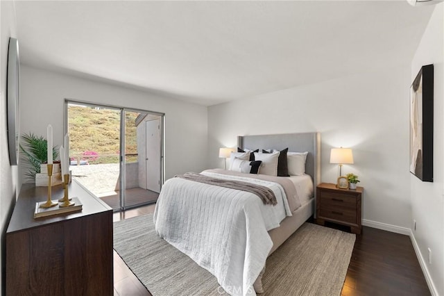21981 Rimhurst Dr Unit 158, Lake Forest, CA 92630 - bedroom with access to exterior and wood finished floors