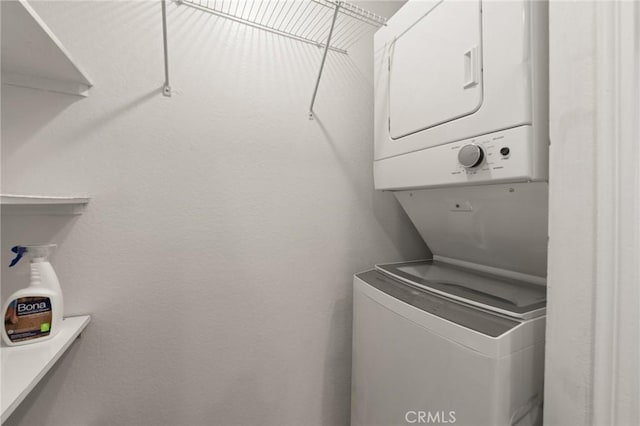 21981 Rimhurst Dr Unit 158, Lake Forest, CA 92630 - laundry room with stacked washer and clothes dryer