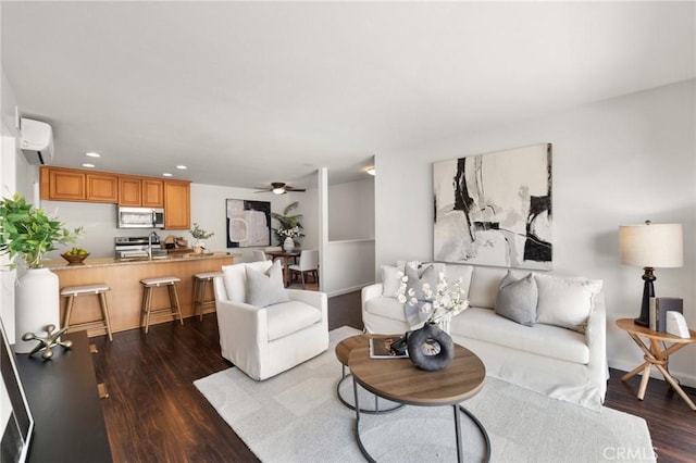 21981 Rimhurst Dr Unit 158, Lake Forest, CA 92630 - living area featuring dark wood-type flooring, ceiling fan, recessed lighting, and a wall mounted AC