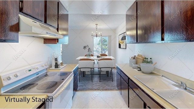 17068 Colima Rd Unit 274, Hacienda Heights, CA 91745 - kitchen featuring white electric range oven, under cabinet range hood, a chandelier, dark brown cabinetry, and light tile patterned flooring