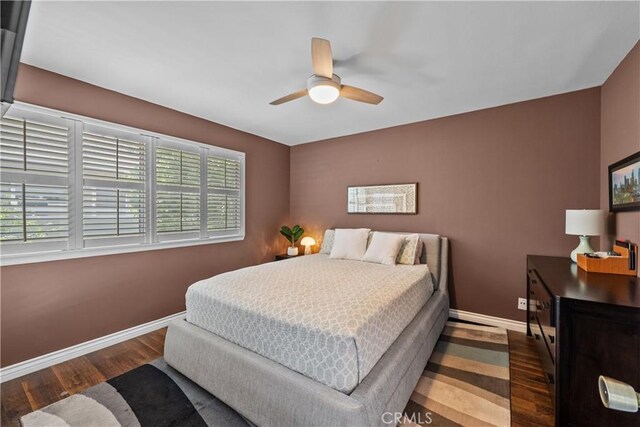 23957 Arroyo Park Dr Unit 146, Valencia, CA 91355 - bedroom with wood finished floors and ceiling fan