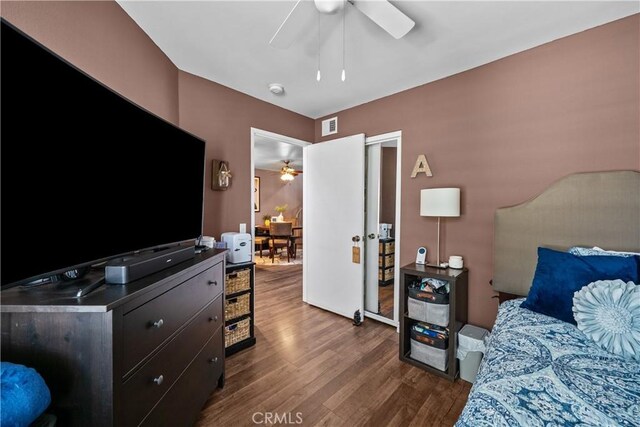 23957 Arroyo Park Dr Unit 146, Valencia, CA 91355 - bedroom featuring dark wood-style flooring and a ceiling fan