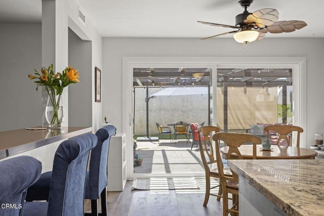 3151 W Hemlock St, Oxnard, CA 93035 - dining room with plenty of natural light, a ceiling fan, and wood finished floors