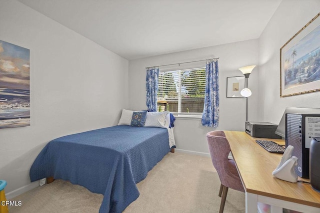 3151 W Hemlock St, Oxnard, CA 93035 - carpeted bedroom featuring a desk and baseboards