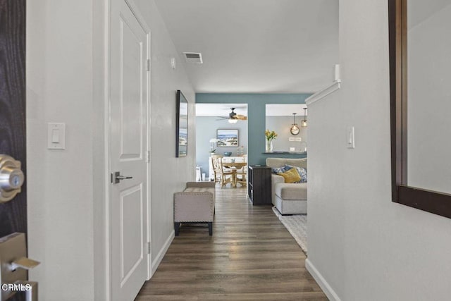 3151 W Hemlock St, Oxnard, CA 93035 - corridor featuring dark wood-type flooring and baseboards