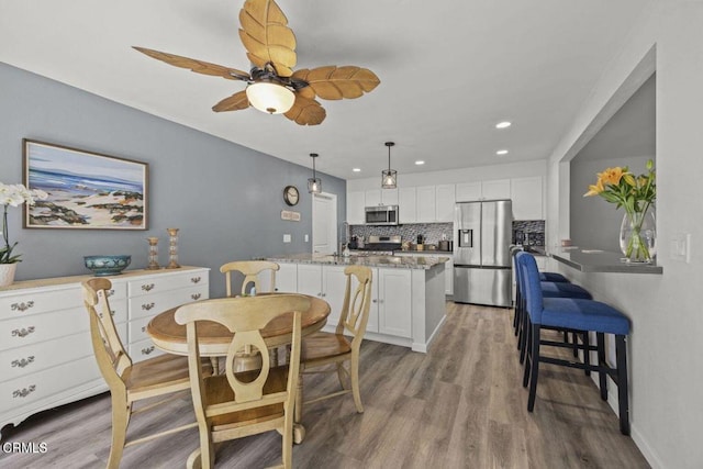 3151 W Hemlock St, Oxnard, CA 93035 - dining space featuring light wood finished floors, recessed lighting, and ceiling fan