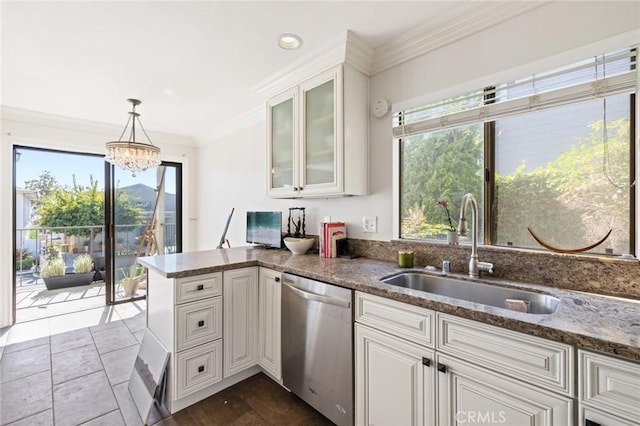 422 Cypress St, Laguna Beach, CA 92651 - kitchen featuring dishwasher, healthy amount of natural light, crown molding, dark stone countertops, and a peninsula