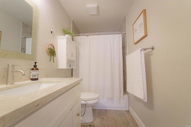7083 Deerhurst Ct, San Diego, CA 92139 - bathroom with vanity, wood finished floors, and shower / bath combo