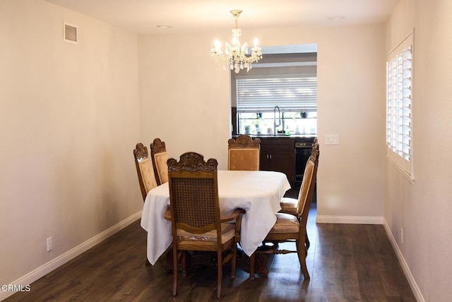 4275 Williams Ave, La Verne, CA 91750 - dining area with a chandelier and dark wood finished floors