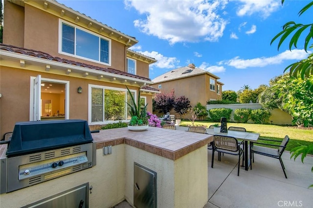 14 Pavona, Newport Coast, CA 92657 - view of patio / terrace with an outdoor kitchen and outdoor dining space