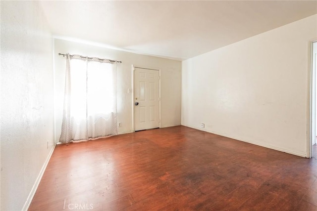 1132 E 65th St, Los Angeles, CA 90001 - spare room with wood finished floors and baseboards
