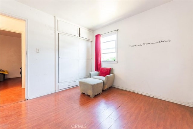 1132 E 65th St, Los Angeles, CA 90001 - living area featuring wood finished floors