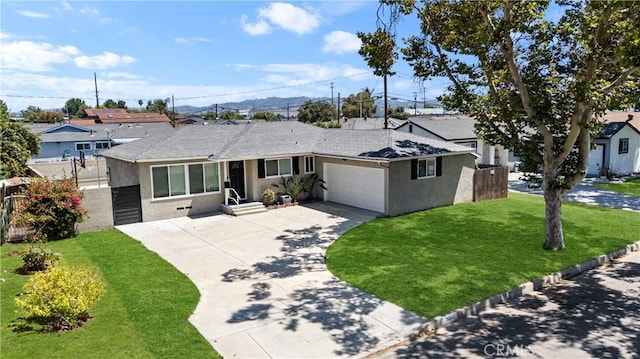 330 Glenshaw Dr, La Puente, CA 91744 - ranch-style house featuring stucco siding, a garage, and concrete driveway