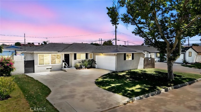 330 Glenshaw Dr, La Puente, CA 91744 - ranch-style house with stucco siding, an attached garage, concrete driveway, and roof with shingles