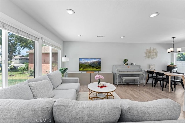 330 Glenshaw Dr, La Puente, CA 91744 - living room with a chandelier, wood finished floors, and recessed lighting