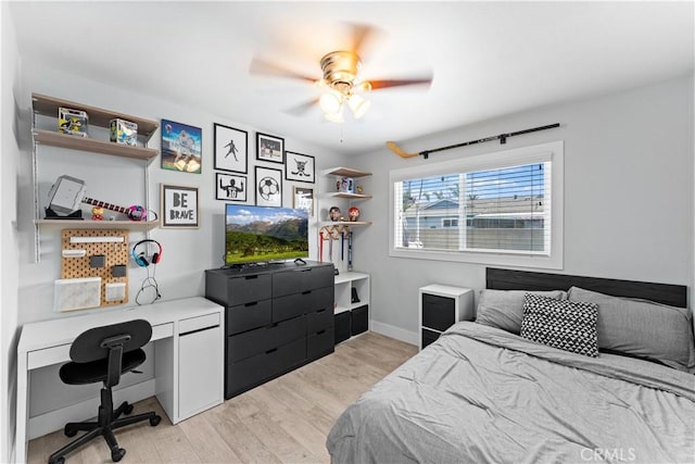 330 Glenshaw Dr, La Puente, CA 91744 - bedroom with light wood-style flooring, a desk, and a ceiling fan