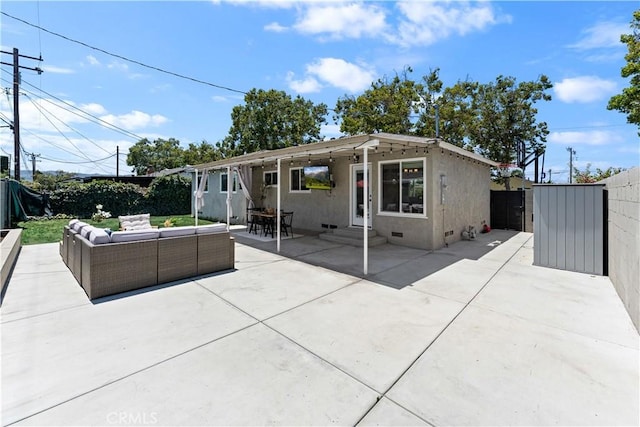 330 Glenshaw Dr, La Puente, CA 91744 - back of house with an outdoor living space, a patio, stucco siding, a gate, and entry steps