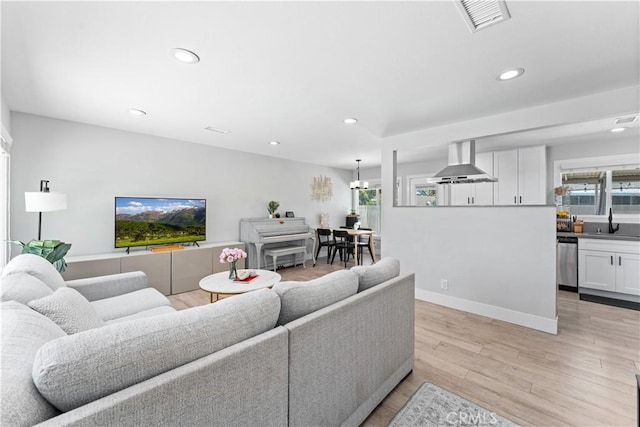 330 Glenshaw Dr, La Puente, CA 91744 - living area featuring recessed lighting, healthy amount of natural light, and light wood finished floors