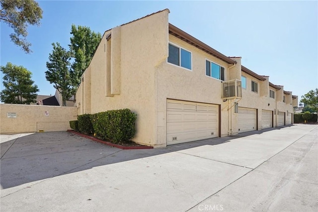 1846 Rosebrook Ln, Rosemead, CA 91770 - view of property exterior featuring stucco siding and an attached garage