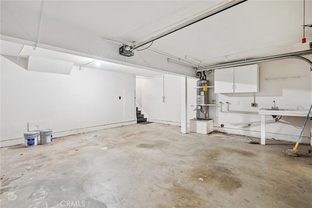 1846 Rosebrook Ln, Rosemead, CA 91770 - garage with a garage door opener and strapped water heater
