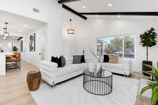 1255 Pecan Pl, Chula Vista, CA 91911 - living area with beamed ceiling, light wood-style floors, recessed lighting, and high vaulted ceiling