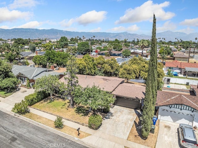 971 N Clifford Ave, Rialto, CA 92376 - aerial view of residential area featuring a mountainous background