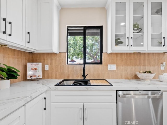 971 N Clifford Ave, Rialto, CA 92376 - kitchen featuring dishwasher, white cabinetry, and glass insert cabinets
