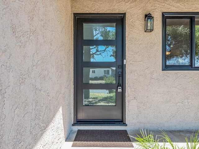 971 N Clifford Ave, Rialto, CA 92376 - view of exterior entry featuring stucco siding