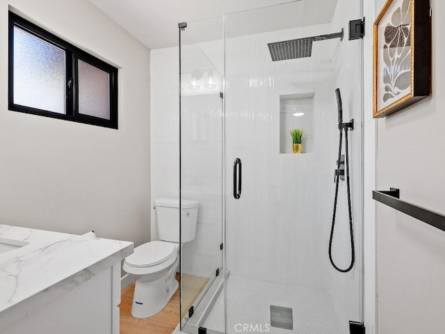 971 N Clifford Ave, Rialto, CA 92376 - full bath featuring a shower stall, vanity, and wood finished floors
